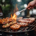 Backyard grilling Mans hand tends barbecue with smoked flavors