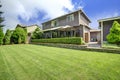 Backyard landscape with trimmed hedges