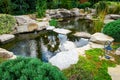 Backyard landscaping, Japanese carp pond Royalty Free Stock Photo