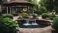 A backyard landscaping with a patio, a waterfall, a pond, a garden, trees, plants, a trellis Royalty Free Stock Photo