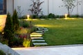 Backyard of the mansion with a flowerbed.