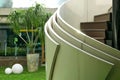 Backyard and modern curve staircase outside building