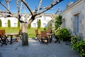 Patio and blooming hortensias, hydrangea, Chateau Cordeillan-Bages, Bordeaux, France