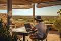 Backyard office with mountain view man working remotely, embracing freelance lifestyle Royalty Free Stock Photo