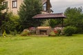 Backyard Patio Area with Fireplace and Furniture. Royalty Free Stock Photo