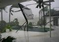 A backyard patio is ripped up from Hurricane winds. Royalty Free Stock Photo