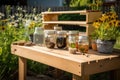 backyard pollinator garden with beekeeping supplies and honey jars