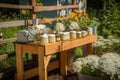 backyard pollinator garden with beekeeping supplies and honey jars