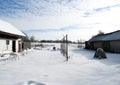 Snowy Backyard of small house