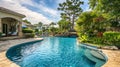 Backyard of home with swimming pool and trees in private place.