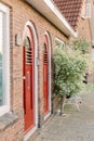 A backyard with two red doors. Royalty Free Stock Photo