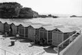 TORREGAVETA, NAPLES, ITALY, 1952 - Young bathers chat in the shade of the bathhouse of Roman Beach taken the roman ruins