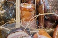 Bacon in assortment on a supermarket window.