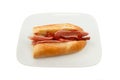 Bacon baguette with tomato ketchup Royalty Free Stock Photo