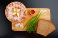 BACON WITH BREAD ONIONS AND KETCHUP ON A WOODEN BOARD Royalty Free Stock Photo