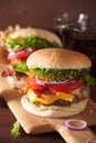 Bacon cheese burger with beef patty, tomato and onion Royalty Free Stock Photo