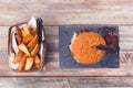 Bacon cheese burger and potato cuts, top view