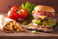Bacon cheese hamburger with beef patty tomato onion Royalty Free Stock Photo