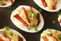 Bacon deviled eggs on black background. Royalty Free Stock Photo