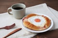Bacon egg bread on plate and hot coffee isolated on table Royalty Free Stock Photo