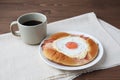 Bacon egg bread on plate and hot coffee isolated on table Royalty Free Stock Photo