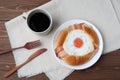 Bacon egg bread on plate and hot coffee  on table Royalty Free Stock Photo