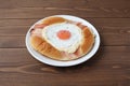 Bacon egg bread on plate isolated on table Royalty Free Stock Photo