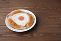 Bacon egg bread on plate isolated on table Royalty Free Stock Photo