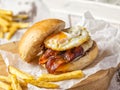 Bacon and egg burger with homemade fries