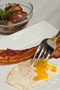 Bacon and egg with roasted red potatoes Royalty Free Stock Photo