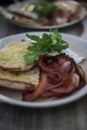 Bacon and Egg Toast Breakfast on white plate