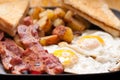 bacon and eggs sunny side up Royalty Free Stock Photo