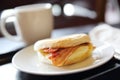 Bacon and fried egg roll with coffee Royalty Free Stock Photo