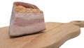 Bacon on a wooden tray isolated on a white background, bacon on a tray, ham, a piece of pork Royalty Free Stock Photo
