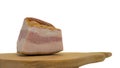 Bacon is isolated on a white background, meat on a wooden tray, bacon, a piece of ham Royalty Free Stock Photo