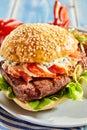 Bacon, lettuce and mayonnaise surf and turf hamburger Royalty Free Stock Photo
