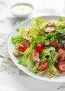 Bacon Lettuce Tomato, BLT salad with creamy dressing sauce, croutons Royalty Free Stock Photo