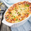 Bacon lovers mac and cheese in baking dish, square format Royalty Free Stock Photo