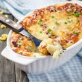 Bacon lovers mac and cheese in baking dish, square Royalty Free Stock Photo