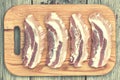 Bacon. Raw steaks on a cutting board Royalty Free Stock Photo