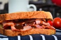 Bacon sandwich with brown sauce Royalty Free Stock Photo