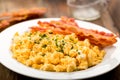 Bacon with scrambled eggs Royalty Free Stock Photo