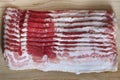 Bacon slice on wooden board