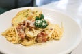 bacon spaghetti, spaghetti carbonara or pasta or pasta carbonara and bread Royalty Free Stock Photo