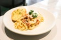 bacon spaghetti, spaghetti carbonara or pasta or pasta carbonara and garlic bread Royalty Free Stock Photo