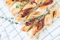 Bacon sticks pastry with black sesame and thyme Royalty Free Stock Photo