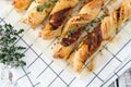 Bacon sticks pastry with black sesame and thyme Royalty Free Stock Photo