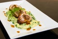 Bacon wrap pork stuff with seafood spinach mashed potato Royalty Free Stock Photo