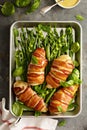 Bacon wrapped chicken breast with asparagus Royalty Free Stock Photo