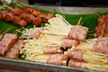 Bacon wrapped Enokitake mushrooms at Bangnamphung Floating Market